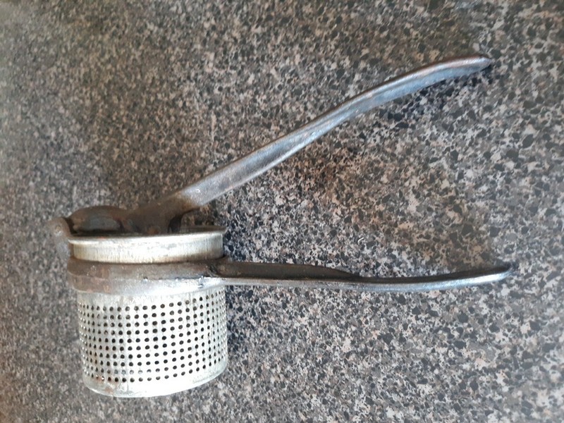 Collectible Vintage Metal Food Press gallery