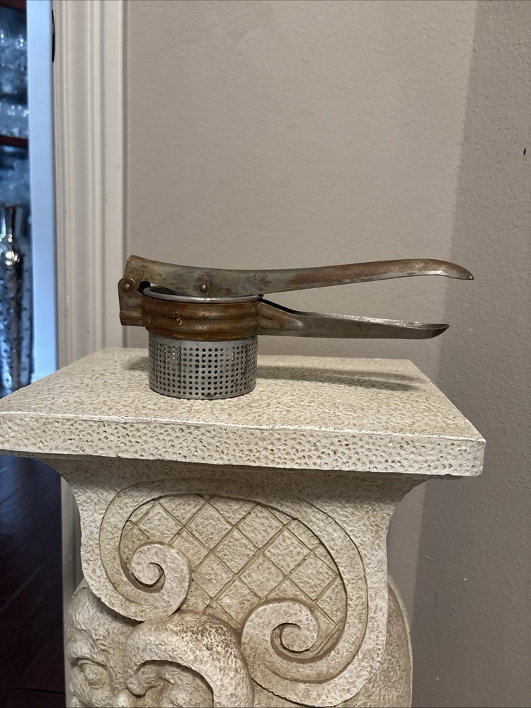 Collectible Vintage Metal Food Press G6