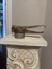 Collectible Vintage Metal Food Press G6