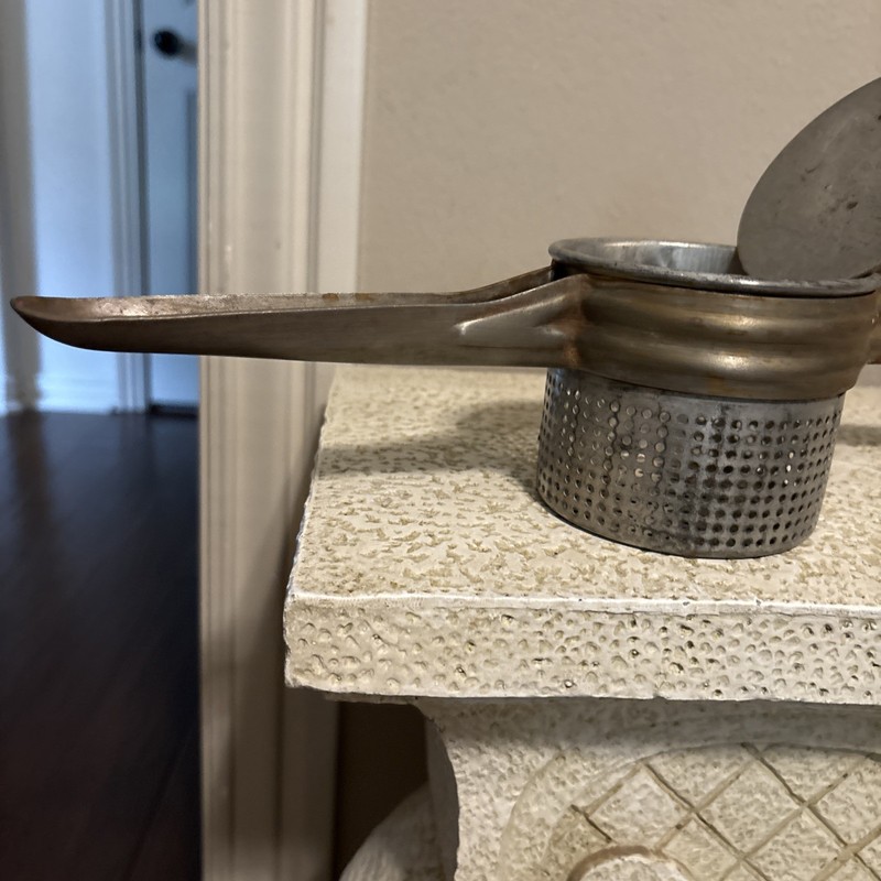 Collectible Vintage Metal Food Press G6 gallery