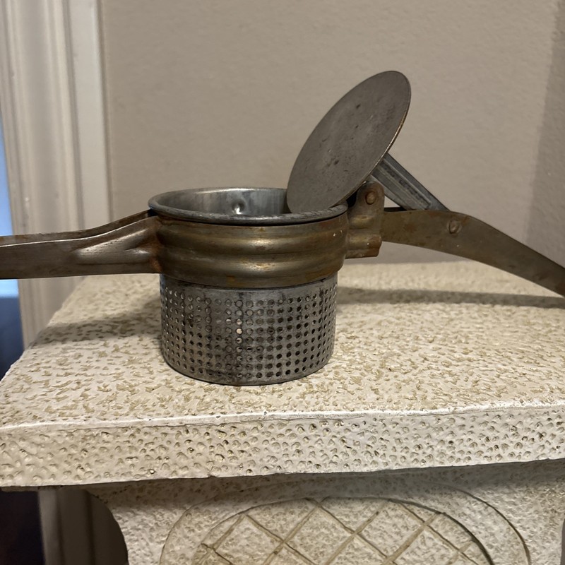 Collectible Vintage Metal Food Press G6 gallery