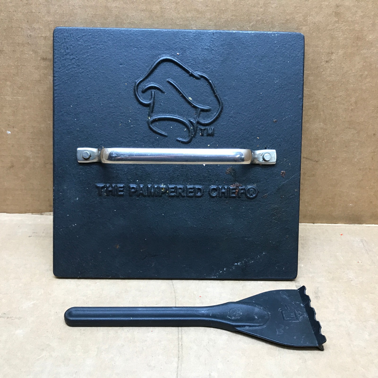 Pampered Chef 8.5" Cast Iron Grill Press and Cleaning Tool gallery